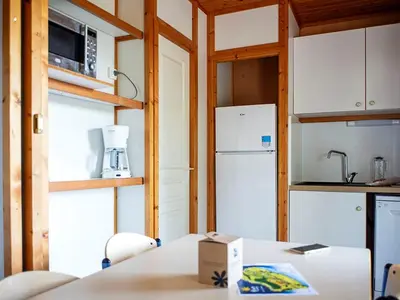 Cuisine ou kitchenette dans l'établissement Chalet 26m² pour 6 pers. avec Terrasse - API-1-52-1063