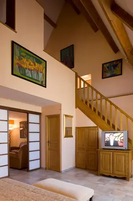 Télévision ou salle de divertissement dans l'établissement Resort Golf Château de Salles