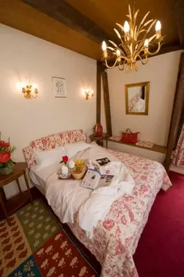 Un ou plusieurs lits dans un hébergement de l'établissement Resort Golf Château de Salles