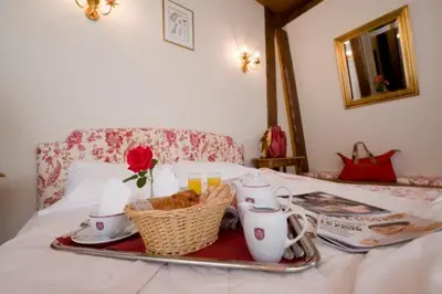 Un ou plusieurs lits dans un hébergement de l'établissement Resort Golf Château de Salles