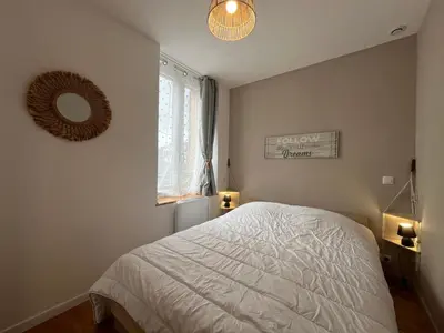 Un ou plusieurs lits dans un hébergement de l'établissement Appartement refait à neuf La Bourboule