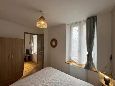 Un ou plusieurs lits dans un hébergement de l'établissement Appartement refait à neuf La Bourboule