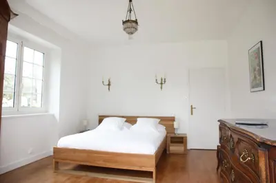 Un ou plusieurs lits dans un hébergement de l'établissement Villa Corrèze Aventure