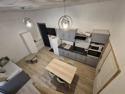 Cuisine ou kitchenette dans l'établissement Appartement 4-6 personnes plein centre