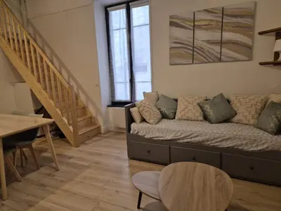 Coin salon dans l'établissement Appartement 4-6 personnes plein centre