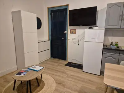 Cuisine ou kitchenette dans l'établissement Appartement 4-6 personnes plein centre