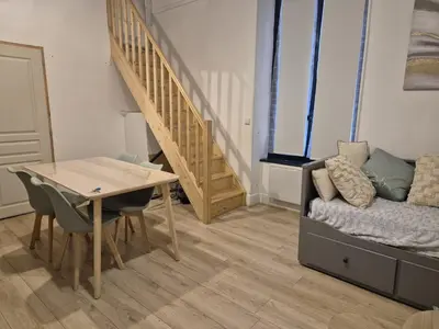 Coin salon dans l'établissement Appartement 4-6 personnes plein centre