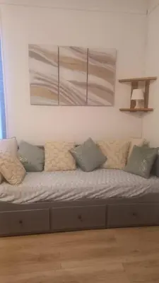 Coin salon dans l'établissement Appartement 4-6 personnes plein centre