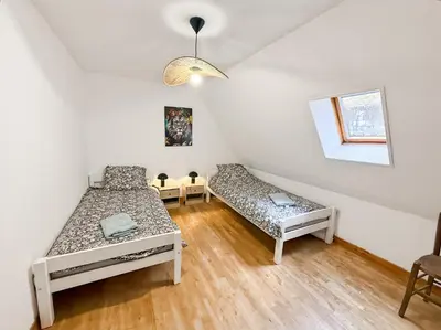 Un ou plusieurs lits dans un hébergement de l'établissement Gîte Rénové - Vue Imprenable Montagne - 2 Chambres