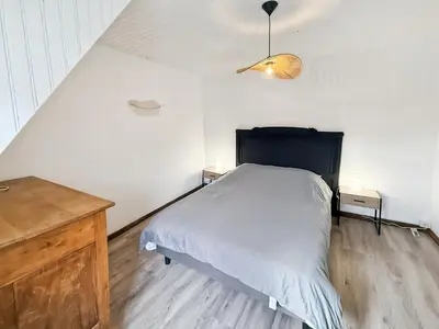 Un ou plusieurs lits dans un hébergement de l'établissement Gîte Rénové - Vue Imprenable Montagne - 2 Chambres