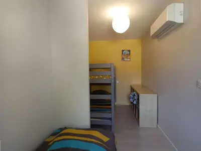 Un ou plusieurs lits dans un hébergement de l'établissement Maison éco-conçue près de Sarlat, 7 pers, Wifi, animaux OK - FR-1-828-11