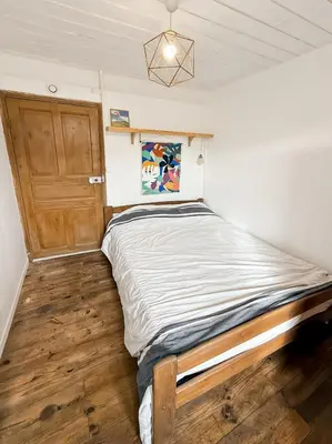 Un ou plusieurs lits dans un hébergement de l'établissement Charmante maison montagnarde - Vue panoramique