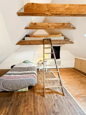 Un ou plusieurs lits dans un hébergement de l'établissement Charmante maison montagnarde - Vue panoramique