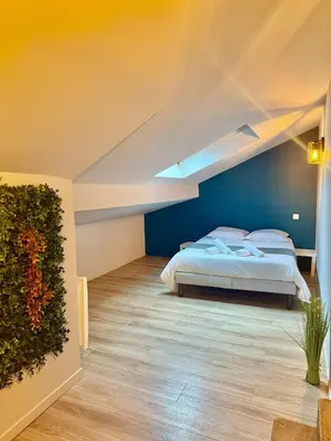 Un ou plusieurs lits dans un hébergement de l'établissement Appartement 5 cocooning Av Georges Dumas -DABNB