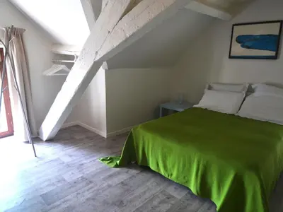 Un ou plusieurs lits dans un hébergement de l'établissement Holiday Home Tannat mit Wallbox by Interhome