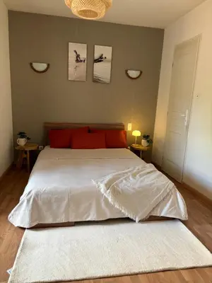 Un ou plusieurs lits dans un hébergement de l'établissement Studio cosy