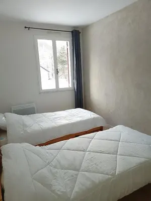 Un ou plusieurs lits dans un hébergement de l'établissement Escapade montagnarde pour la famille