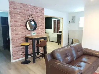 Télévision ou salle de divertissement dans l'établissement Escapade montagnarde pour la famille