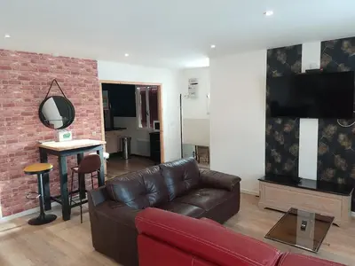 Télévision ou salle de divertissement dans l'établissement Escapade montagnarde pour la famille