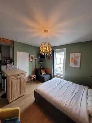 Un ou plusieurs lits dans un hébergement de l'établissement Appartement à La bourboule