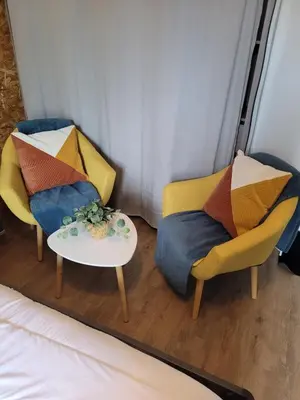 Coin salon dans l'établissement Appartement à La bourboule