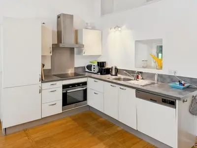 Cuisine ou kitchenette dans l'établissement La Maison du Château de La Borie - Maurs - Cantal