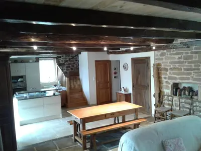 Un ou plusieurs lits dans un hébergement de l'établissement Charmante maison de campagne
