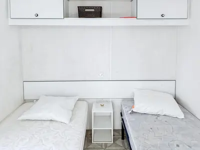 Un ou plusieurs lits dans un hébergement de l'établissement Mobil-home Le Cerisier, 4 pers