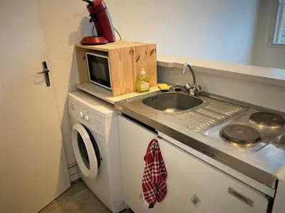 Cuisine ou kitchenette dans l'établissement Appartement double dans le centre de Limoges