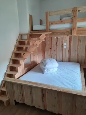 Un ou plusieurs lits dans un hébergement de l'établissement La Bourboule - Étoile des neiges - Ambiance montagne - Appartement rénové, 2 chambres Wifi - Randonnée la Roche des Fées