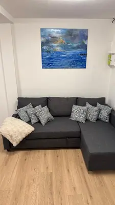 Coin salon dans l'établissement Confort au Mont-Dore & Animaux Admis