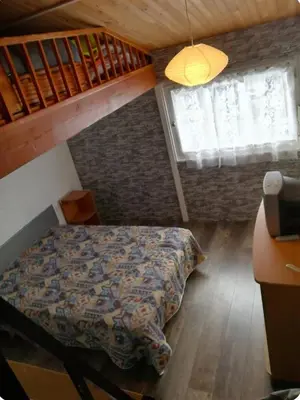 Un ou plusieurs lits dans un hébergement de l'établissement Maison 2-4 personnes, vue sur le Sancy