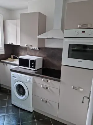 Cuisine ou kitchenette dans l'établissement Appartement T1 Bis centre ville - cathédrale Limoges