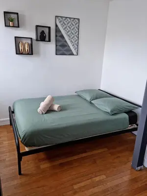 Un ou plusieurs lits dans un hébergement de l'établissement Appartement T1 Bis centre ville - cathédrale Limoges
