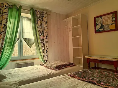 Un ou plusieurs lits dans un hébergement de l'établissement La p'tite Maison