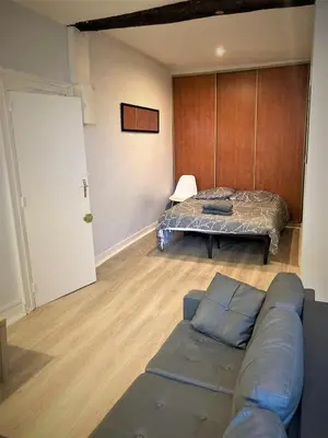 Un ou plusieurs lits dans un hébergement de l'établissement Studio dans l'hypercentre de Limoges