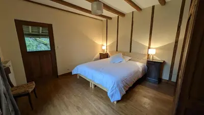 Un ou plusieurs lits dans un hébergement de l'établissement Maison des bois