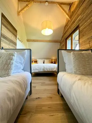 Un ou plusieurs lits dans un hébergement de l'établissement Renovated Chalet With Ski Access At Super-Besse