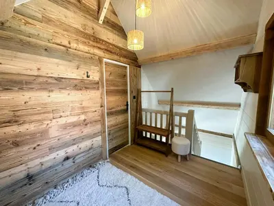 Un ou plusieurs lits dans un hébergement de l'établissement Renovated Chalet With Ski Access At Super-Besse