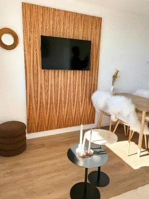 Télévision ou salle de divertissement dans l'établissement Renovated Studio Near Super-Besse Ski Slopes