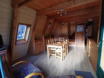 Coin salon dans l'établissement Chalet du Lioran