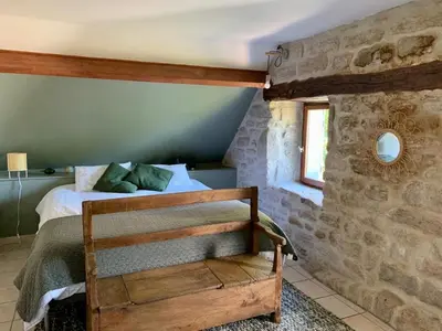 Un ou plusieurs lits dans un hébergement de l'établissement Eco-Lodge In The Heart Of Plateau De Millevaches