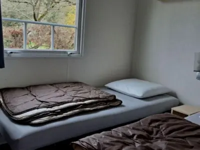 Un ou plusieurs lits dans un hébergement de l'établissement Mobil-home cosy 4 pers avec terrasse - API-1-52-1239
