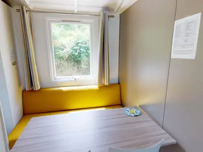 Un ou plusieurs lits dans un hébergement de l'établissement Mobil-home avec terrasse à Vic-sur-Cère, 4 personnes - API-1-52-1251
