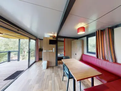 Coin salon dans l'établissement Chalet 5 personnes avec terrasse - API-1-52-1256