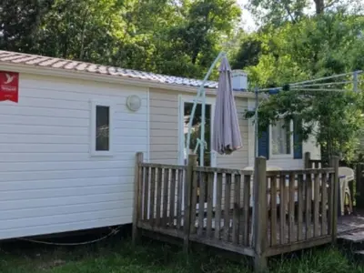 Jardin de l'établissement Mobil home confortable pour 5 avec terrasse - API-1-52-1254