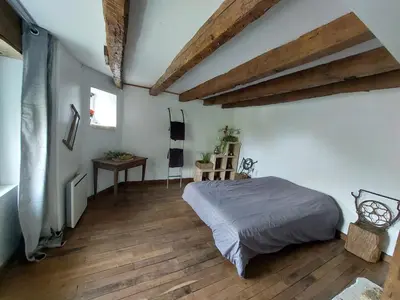 Un ou plusieurs lits dans un hébergement de l'établissement Maison spacieuse