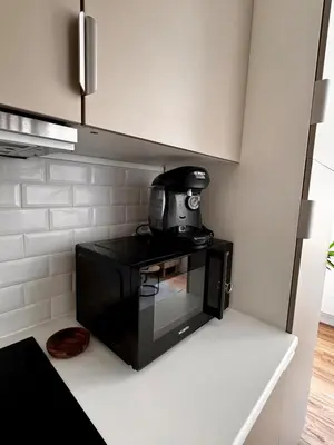 Cuisine ou kitchenette dans l'établissement L'imaginaire au pied de la vieille ville