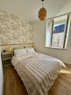 Un ou plusieurs lits dans un hébergement de l'établissement L'imaginaire au pied de la vieille ville