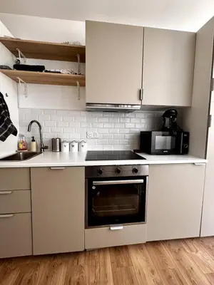 Cuisine ou kitchenette dans l'établissement L'imaginaire au pied de la vieille ville